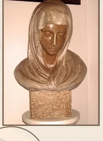 Bust d'una dona amb el cap cobert