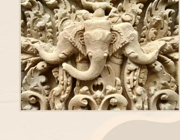 Relleu de pedra amb caps d'elefant