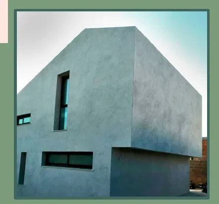 Edifici modern amb volums geomètrics llisos